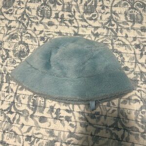 Soft, fuzzy baby blue rave bucket hat